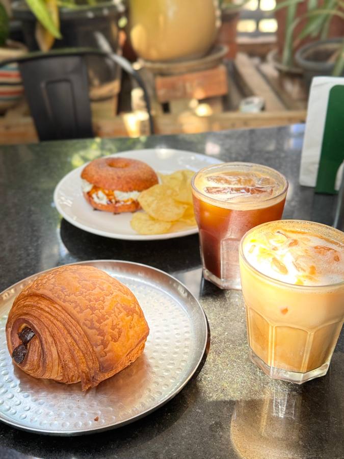 Bagel, pain au chocolat and two coffees at Sourhouse