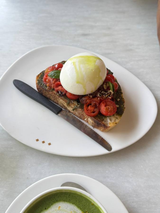 Burrata on sourdough toast with cherry tomatoes