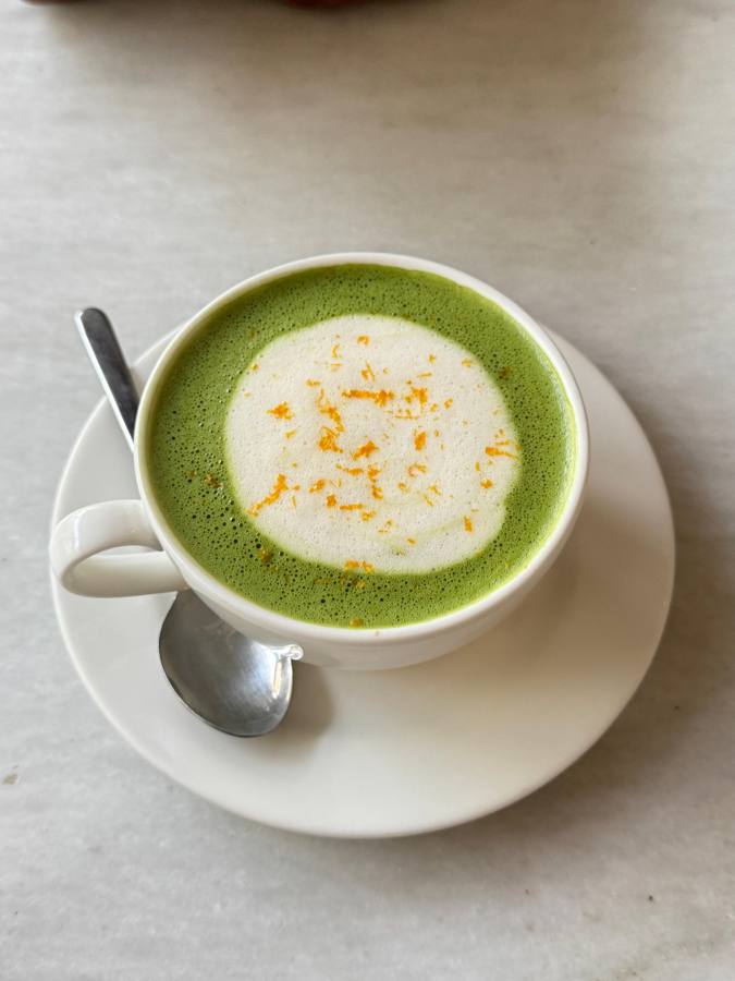 Matcha latte in a white cup