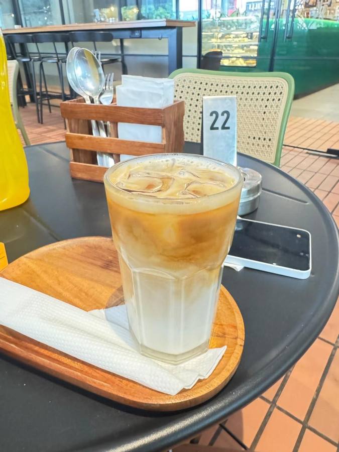 Iced latte at table 22